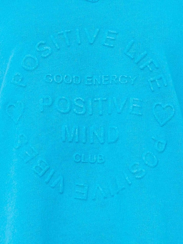 Zwillingsherz Sweter 'Positive Mind' w kolorze niebieski