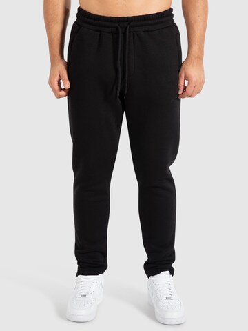 Smilodox Slim fit Trousers 'Evra' in Black: front
