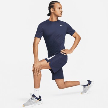 NIKE Regular Sportshorts in Blau