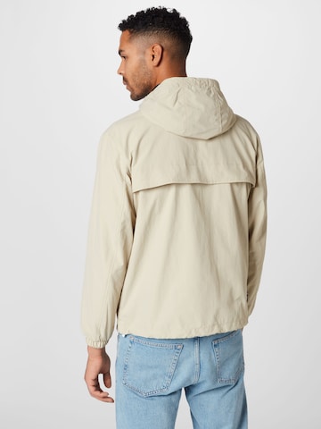 Tommy Jeans Between-Season Jacket 'Chicago' in Beige