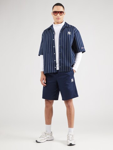Champion Authentic Athletic Apparel Loosefit Nadrág - kék