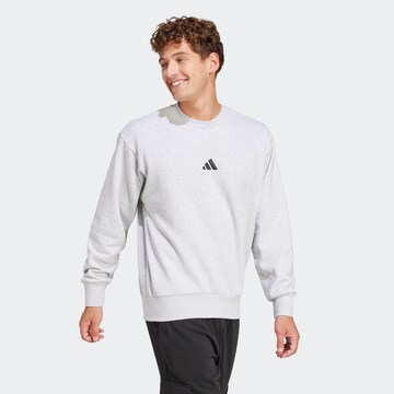 ADIDAS SPORTSWEAR Sports sweatshirt 'FEELCOZY' in Grey