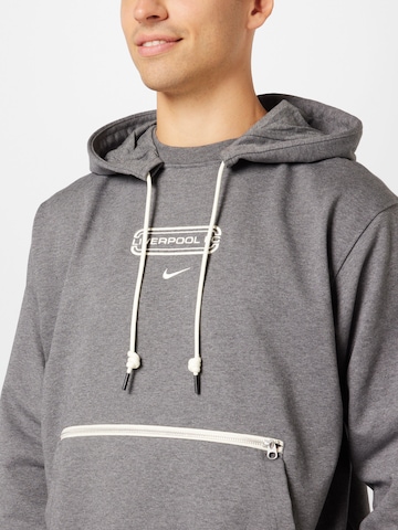 NIKE - Sweatshirt de desporto em cinzento