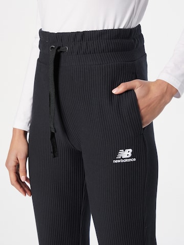 Wide Leg Pantalon 'Athletics Track' new balance en noir
