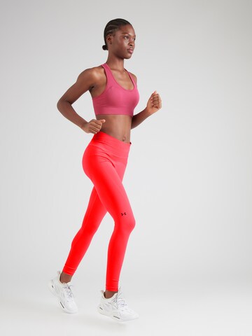 Skinny Pantaloni sportivi di UNDER ARMOUR in rosso