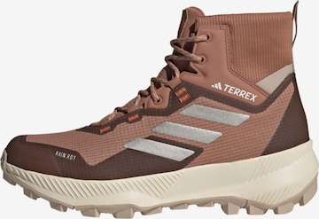 Boots ADIDAS TERREX en marron : devant