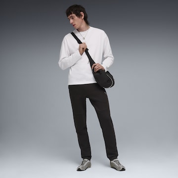 Effilé Pantalon 'PumaTech' PUMA en noir