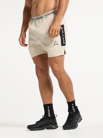 regular Pantaloni sportivi di A-Game in beige: frontale
