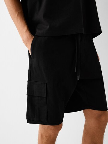 Loosefit Pantaloni cargo di Bershka in nero