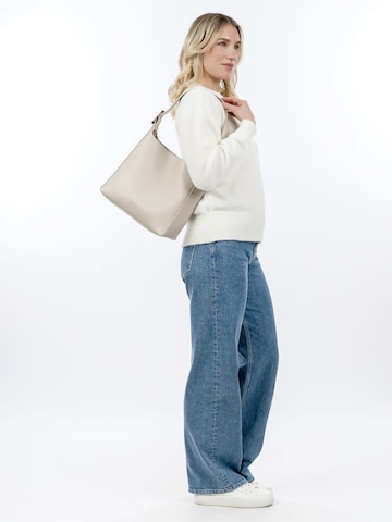 Poche ventrale ' TAS Gunda ' Tamaris en beige : devant