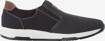 Rieker Slip-Ons in Black