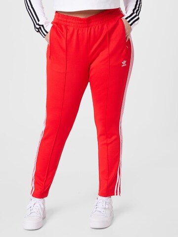 Coupe slim Pantalon ADIDAS ORIGINALS en rouge : devant