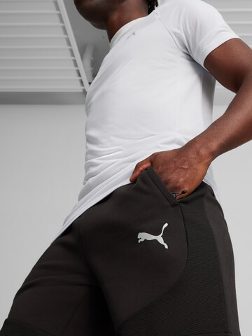 PUMA Normalny krój Spodnie sportowe 'Evostripe' w kolorze czarny