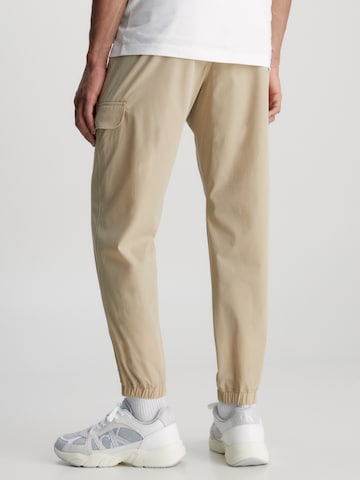 Calvin Klein Jeans Tapered Hose in Beige