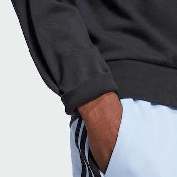 ADIDAS SPORTSWEAR Sports sweatshirt 'Essentials' in Black