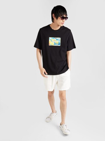Tricou 'JORNOTO ART' de la JACK & JONES pe negru