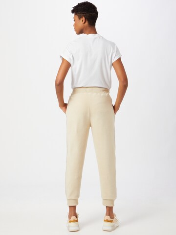 Effilé Pantalon de sport HIIT en beige