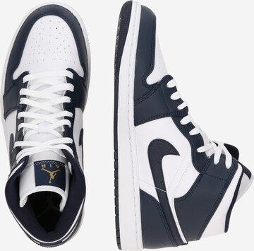 Baskets hautes 'Air Jordan 1 Mid' Jordan en gris