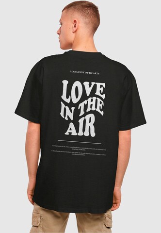 Merchcode Shirt 'Love In The Air' in Zwart: voorkant