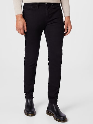 FRAME Regular Jeans i svart: framsida