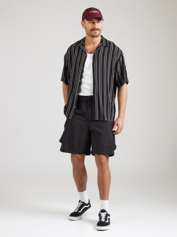 THE NORTH FACE Loose fit Cargo trousers in Black