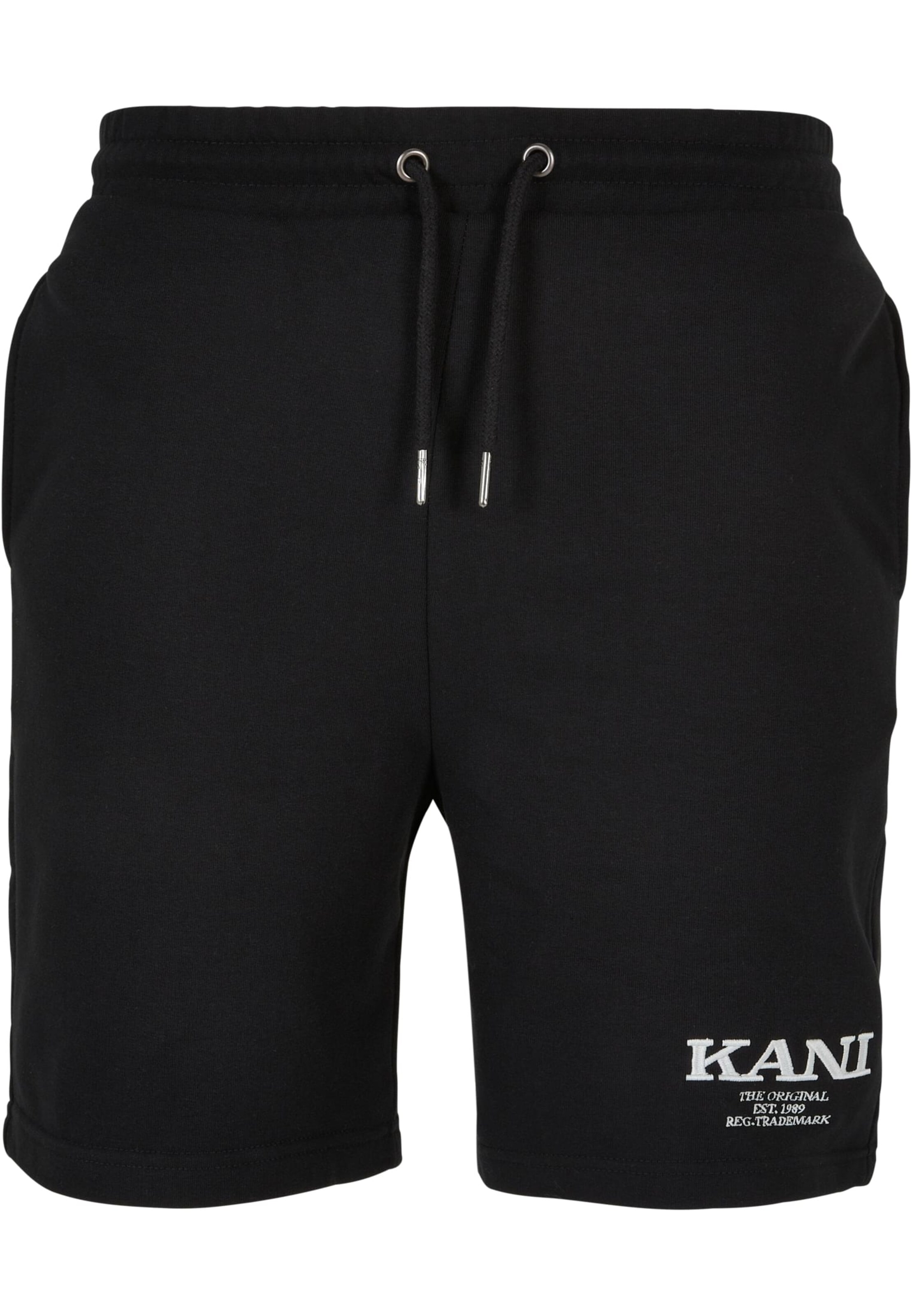 Karl Kani Regular Pants in Black: front
