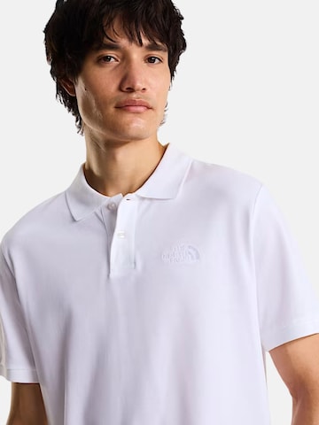 THE NORTH FACE - Camiseta 'THE NORTH FACE M ESS RG POLO TEE POLO' en blanco