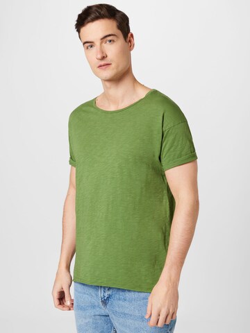 Nudie Jeans Co T-shirt 'Roger Slub' i grön: framsida