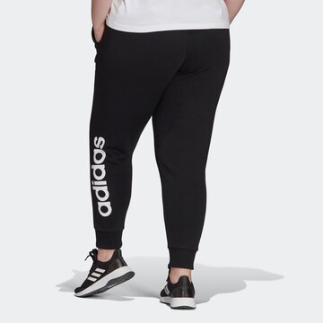 ADIDAS SPORTSWEAR Tapered Workout Pants 'Essentials French Terry Logo ' in Black