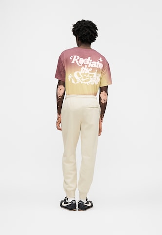 Nike Sportswear Tapered Trousers 'Club' in Beige