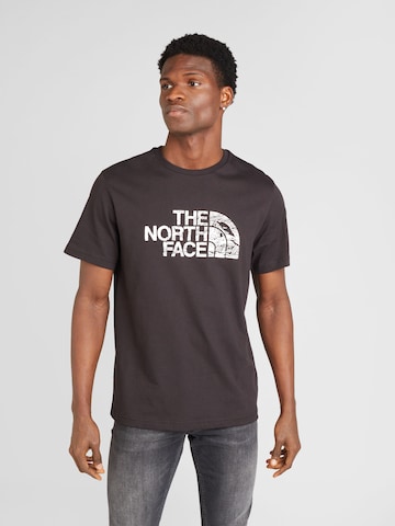 THE NORTH FACE Тениска 'WOODCUT DOME' в черно: отпред