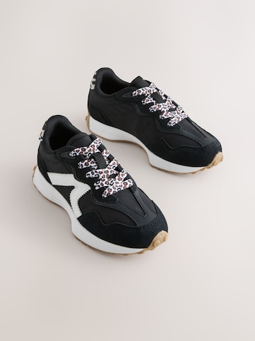 Baskets Next en noir