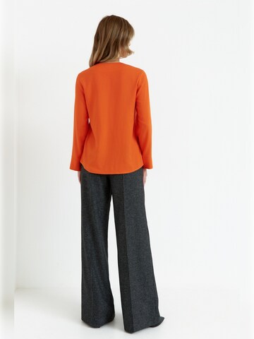 Stylove - Blusa en naranja