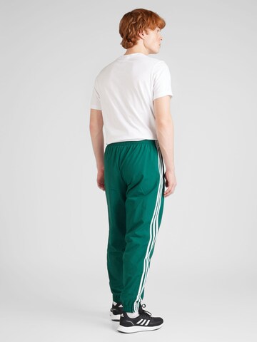ADIDAS ORIGINALS Zúžený Kalhoty – zelená