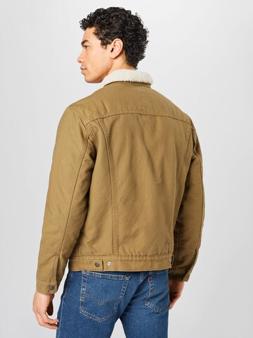 LEVI'S ® Jacke 'Type 3 Sherpa Trucker Jacket' in Grün