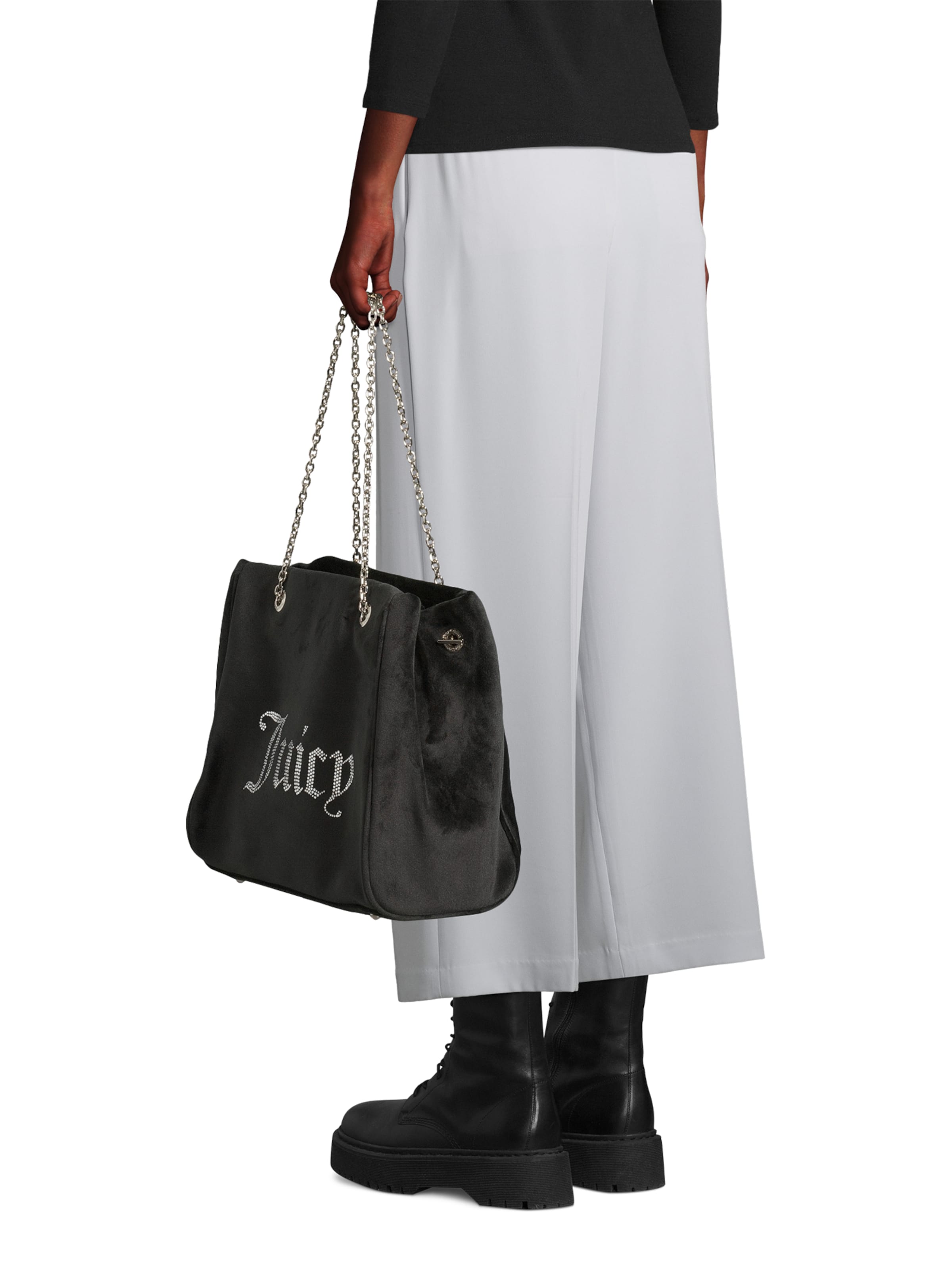 Plase de cumpărături de la Juicy Couture pe negru