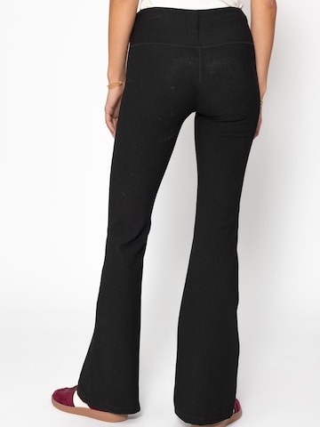 SASSYCLASSY Flared Leggings‌‌‌‌‌‌‌‌‌‌ in Schwarz