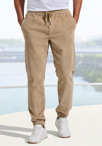 Tapered Pantaloni di JOHN DEVIN in beige