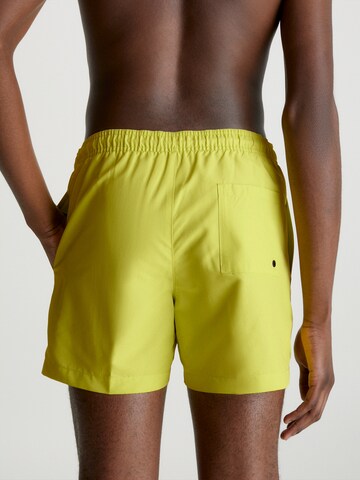 Calvin Klein Swimwear Board Shorts 'Intense Power' in Yellow