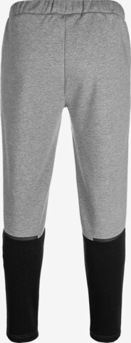 Effilé Pantalon de sport 'Team Cup' PUMA en gris