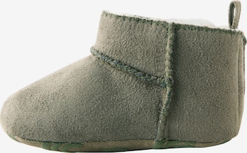 Neonato di Next in verde: frontale