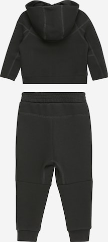 Nike Sportswear Φόρμα τρεξίματος 'TECH FLEECE' σε μαύρο