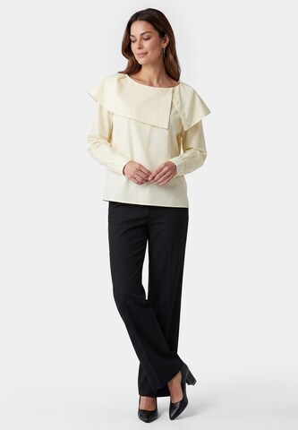 Usha - Blusa en amarillo