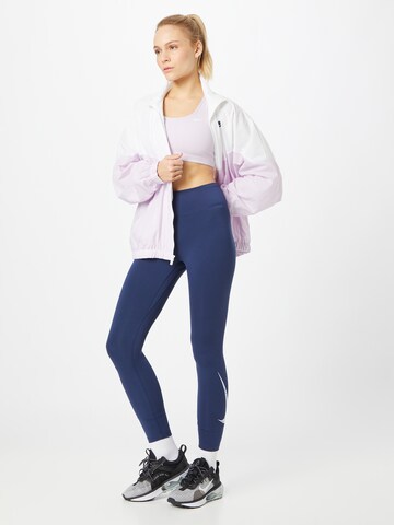 NIKE Skinny Sporthose in Blau