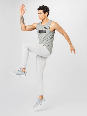 PUMA Sporttop in Grau