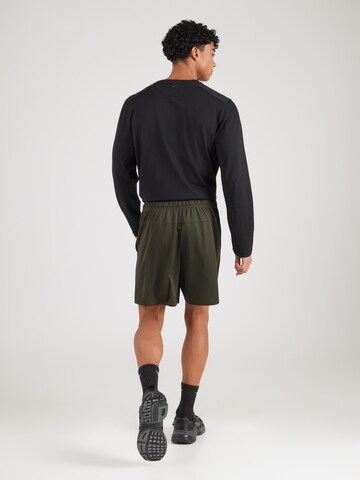 NIKE Regular Workout Pants 'FLEX' in Green