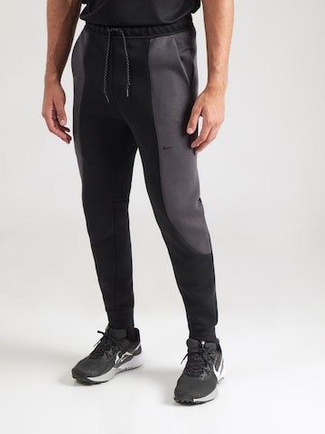 Nike Sportswear Tapered Trousers 'Tech Fleece' in Black: front