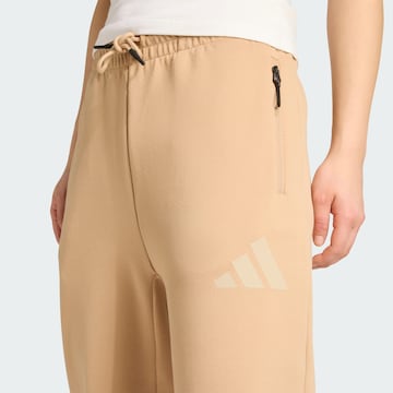 ADIDAS SPORTSWEAR - Tapered Calças de desporto 'Z.N.E.' em bege