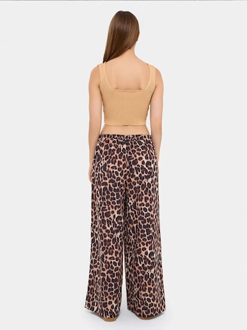 Top di Hiccup in marrone