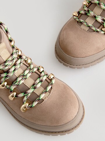 Bottes Next en beige